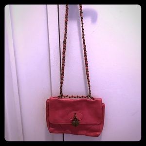 Pink bag with chain.